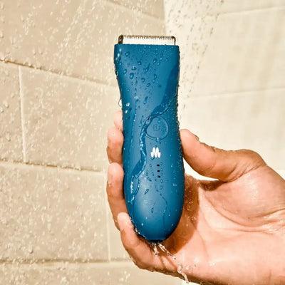 Meridian trimmer held under running water in shower